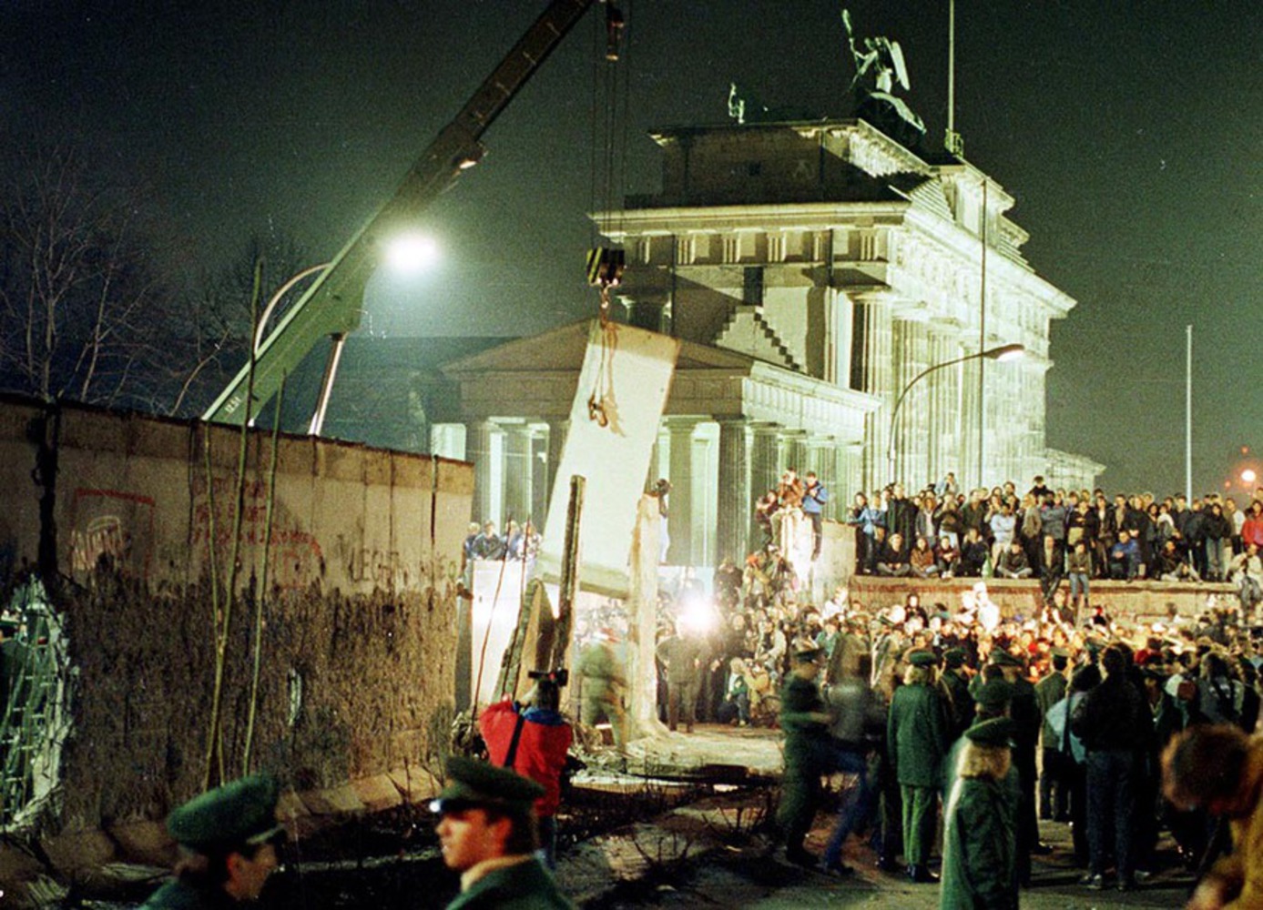 A section of the berlin wall is lifted data.thumb